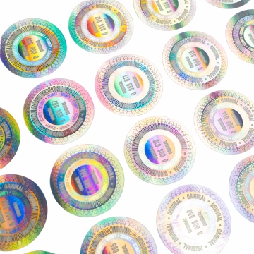A pair of certified holographic, numbered seals with a UV security feature